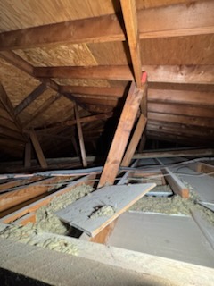 Attic repair and home improvement project in progress